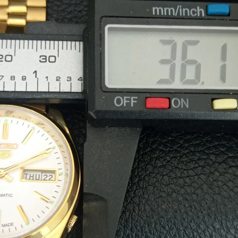 Vintage 1985 Seiko Automatic Mens Gold Watch W/daydate & White accents